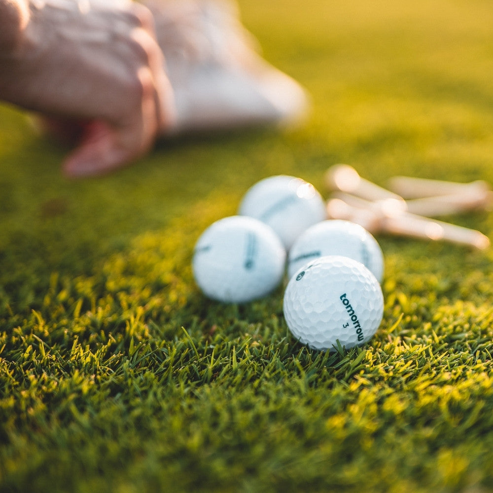 tomorrow golf balls on grass